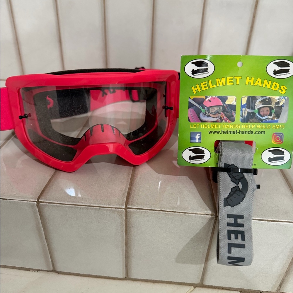 Fox riding glasses and helmet hands